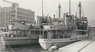 The stern of two similar ships