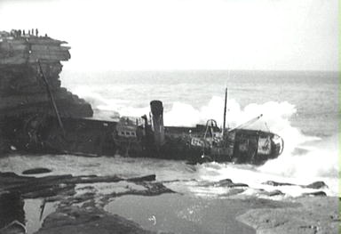 The seas smash into the wreck