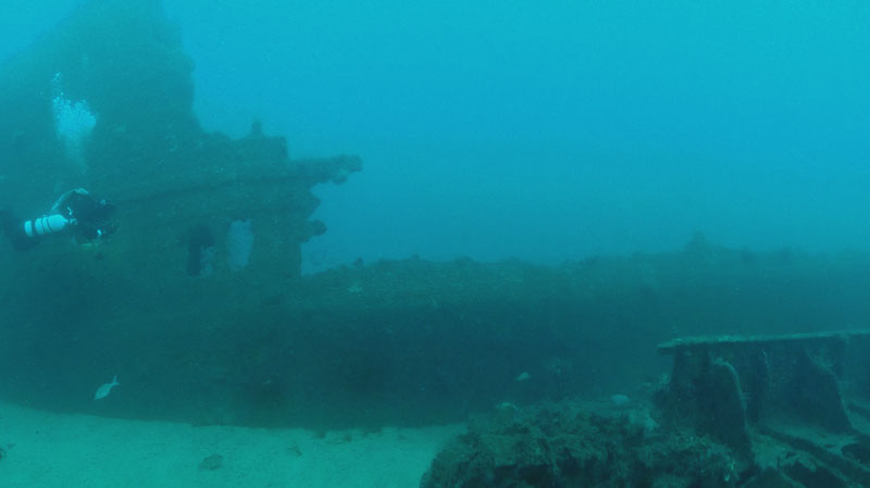 Forward of the boiler
