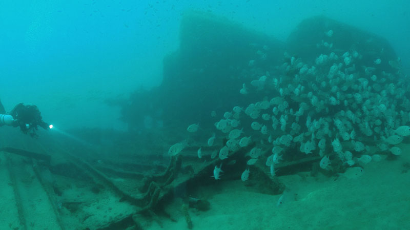 Forward of the boiler